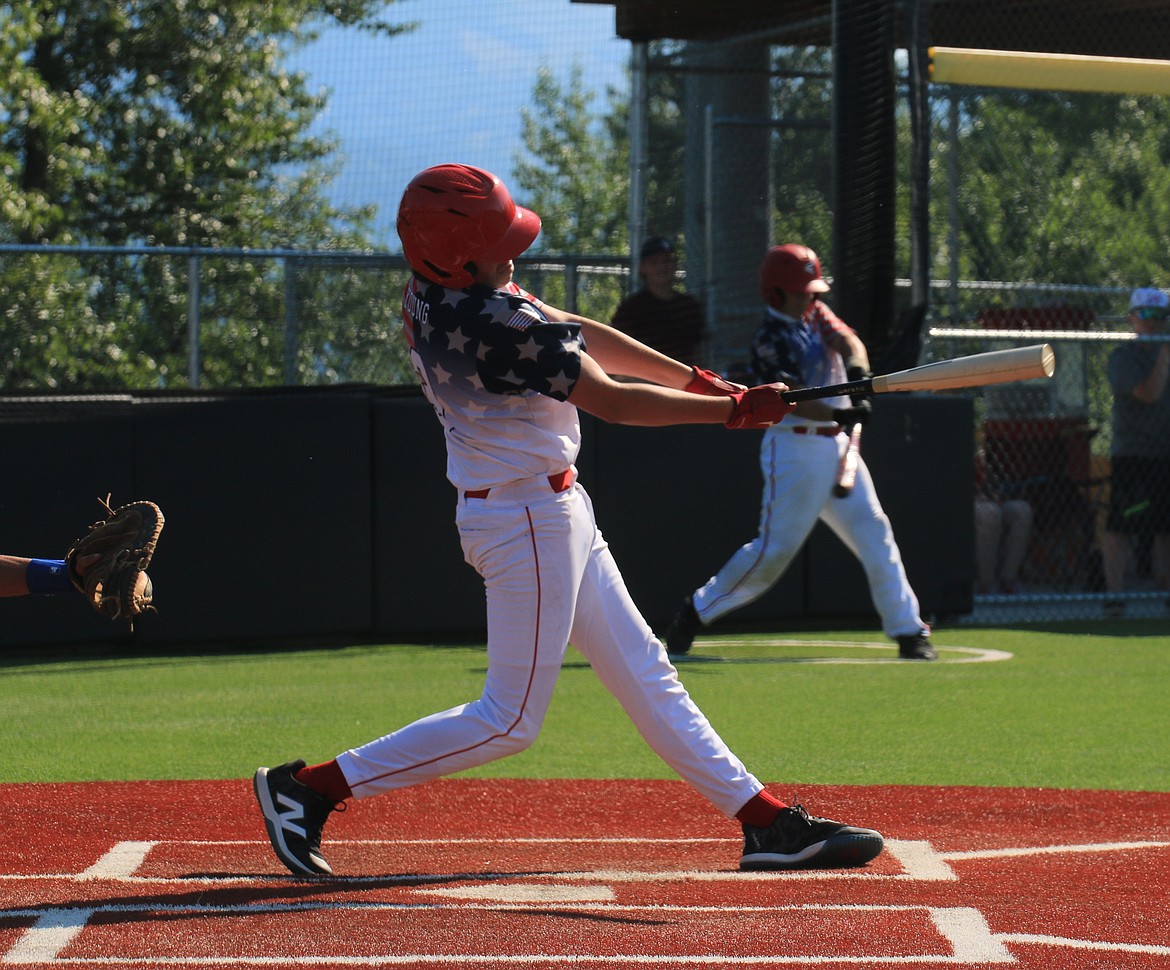 Austyn Young of 16U North Idaho Lakers rips a double to center field against Kettle Falls on Tuesday.