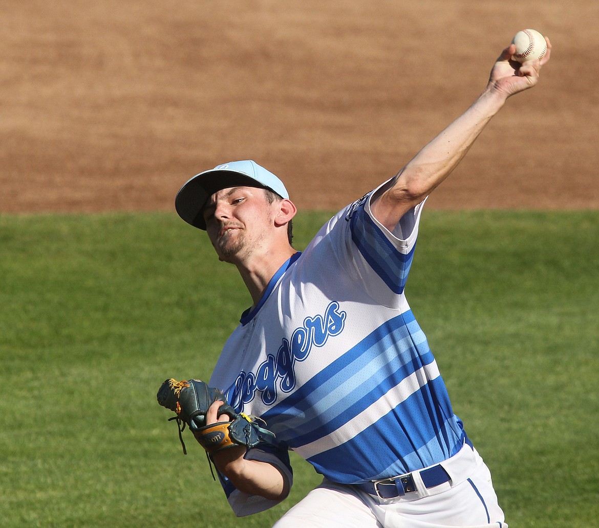 Libby Loggers lefty Noah Gillespie delivers a 1-2 pitch to Kalispell's Jordan Griffin for a strikeout in the top of the first inning. The Sluggers won 22-3. (Paul Sievers/The Western News)