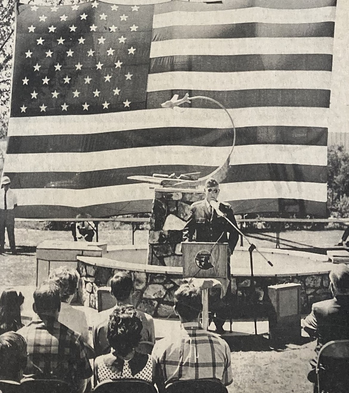 On July 13, 1969, retired Col. Tracy Petersen dedicates a memorial statue to popular hydroplane racer Warner Gardner.