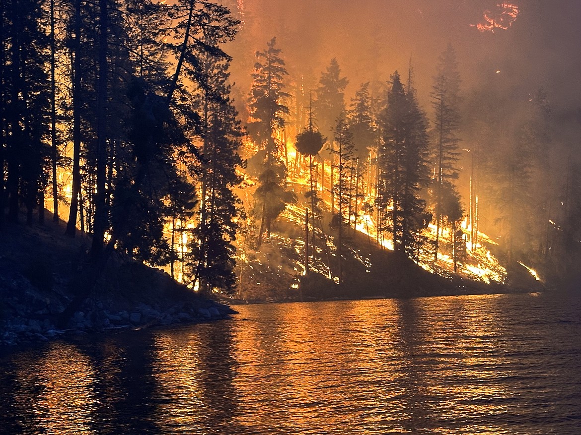 The Pioneer Fire blazes away on the shore of Lake Chelan. The fire had grown to more than 12,000 acres and was only 14% contained.