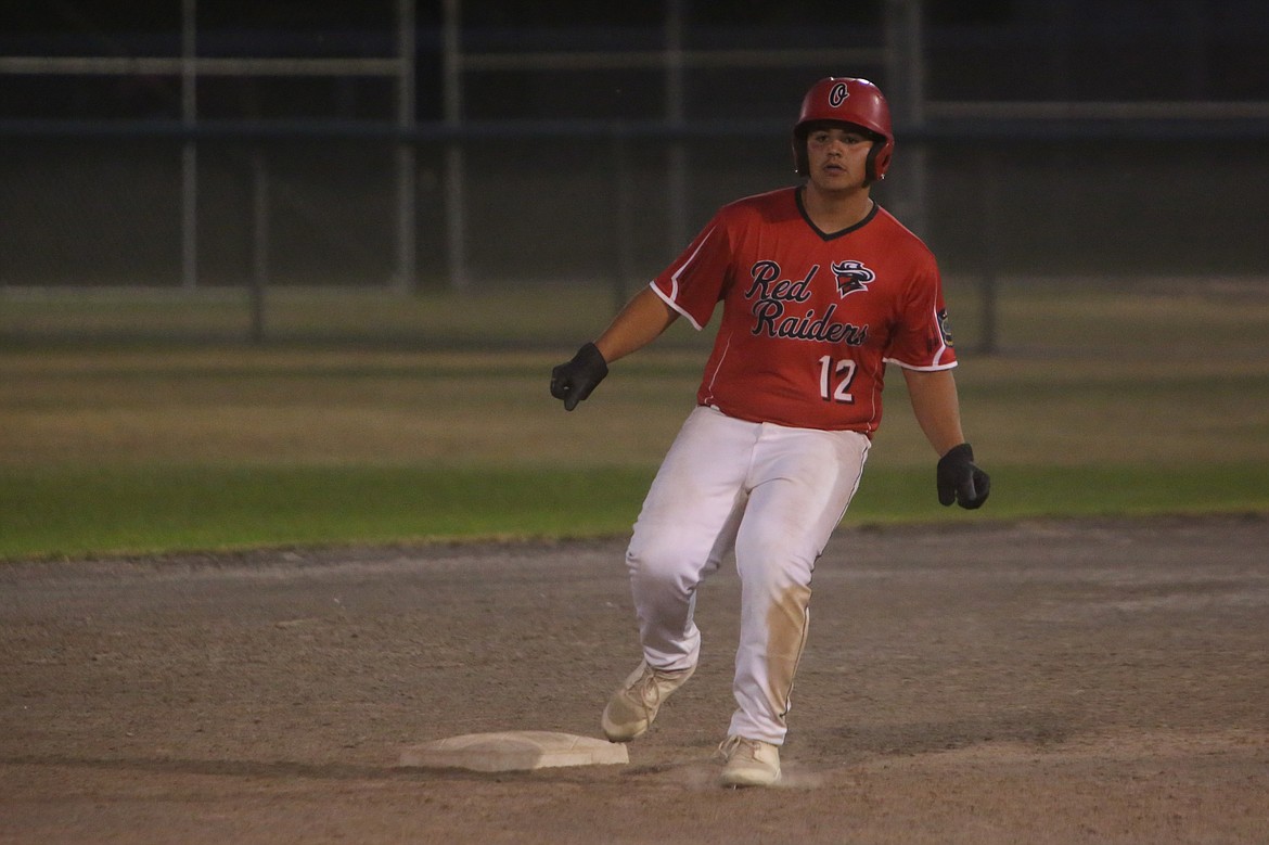 Red Raider right fielder/pitcher Carlos Castillo reaches second base during the nightcap of Tuesday’s doubleheader against the AA Columbia Basin River Dogs. Castillo led the team with two hits and three RBI in the game.