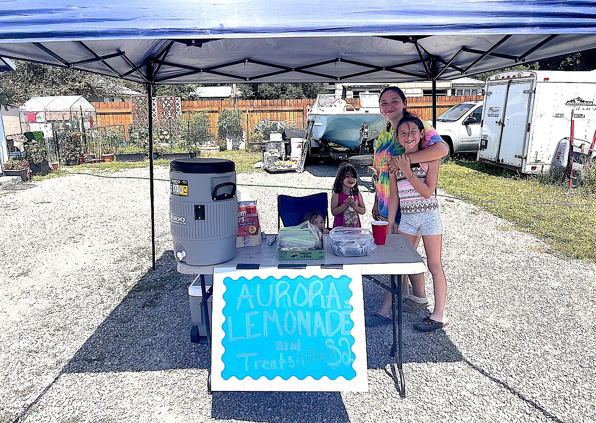 Aurora's Lemonade and Treats on East 6th Street in Libby has the goods to help beat the heat. From left, the Rodriquez family, including Isabella, Miranda, mom Sam and Aurora. (Taylor Resch/The Western News)