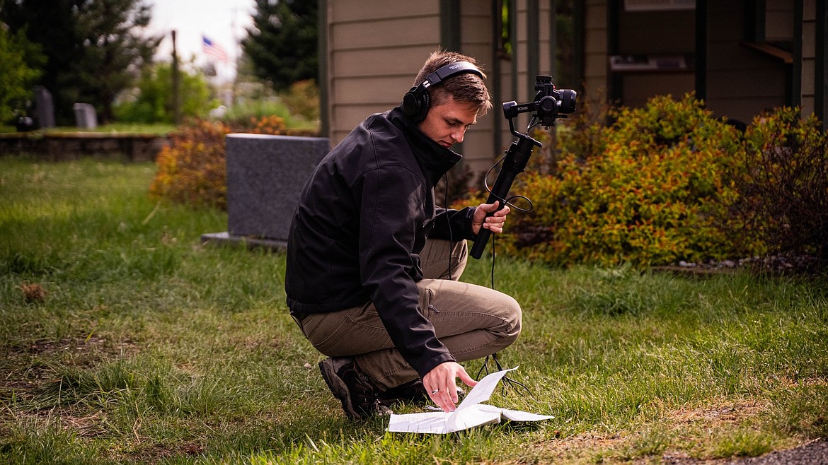 Director Taylor Riley skims the script for "Odd or Even III" as he attempts to fit a demanding batch of scenes into only a few short hours.