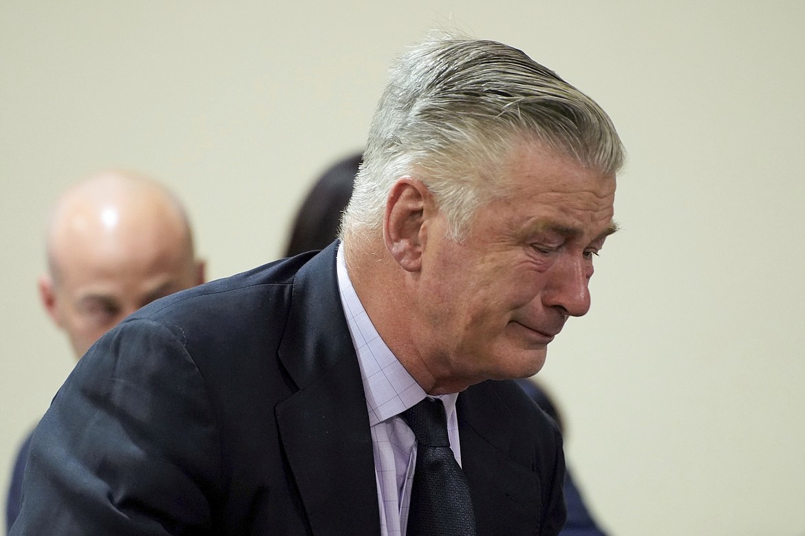 Actor Alec Baldwin reacts during his trial for involuntary manslaughter for the 2021 fatal shooting of cinematographer Halyna Hutchins during filming of the Western movie "Rust," Friday, July 12, 2024, at Santa Fe County District Court in Santa Fe, N.M. The judge threw out the case against Baldwin in the middle of his trial and said it cannot be filed again. (Ramsay de Give/Pool Photo via AP)