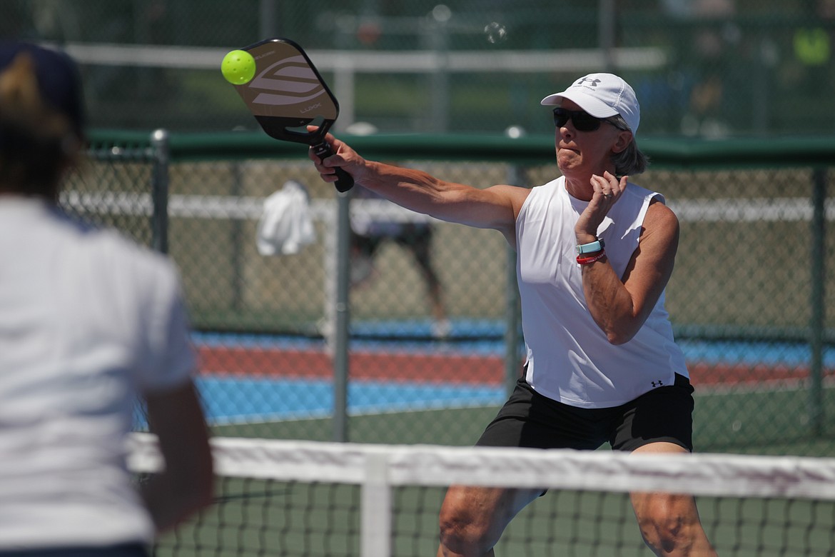 MARK NELKE/Press
Pam Olive of Chestermere, Alberta, hits a return during the annual Coeur d'Alene Classic pickleball tournament Friday at Cherry Hill Park in Coeur d'Alene. Olive partnered with Christy Daurie of Okotoks, Alberta, in the women's doubles 3.0 age 50-55 division.