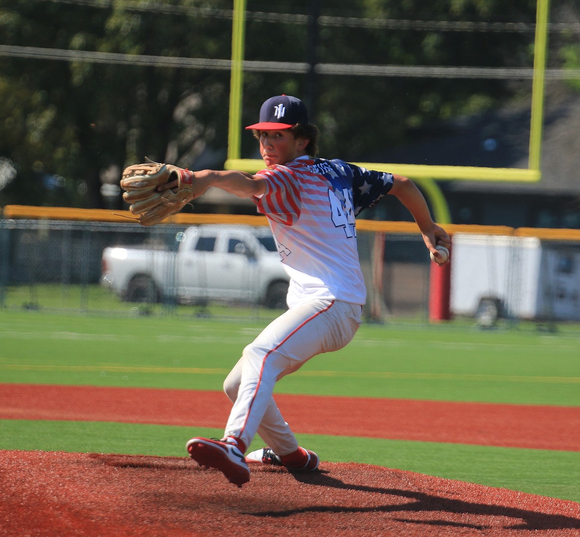 Sage Medeiros gets ready to fire a pitch during the second game against Orofino. Medeiros, who got the win after six innings of work, struck out six batters and gave up just five hits, one walk, and one earned run on Friday.