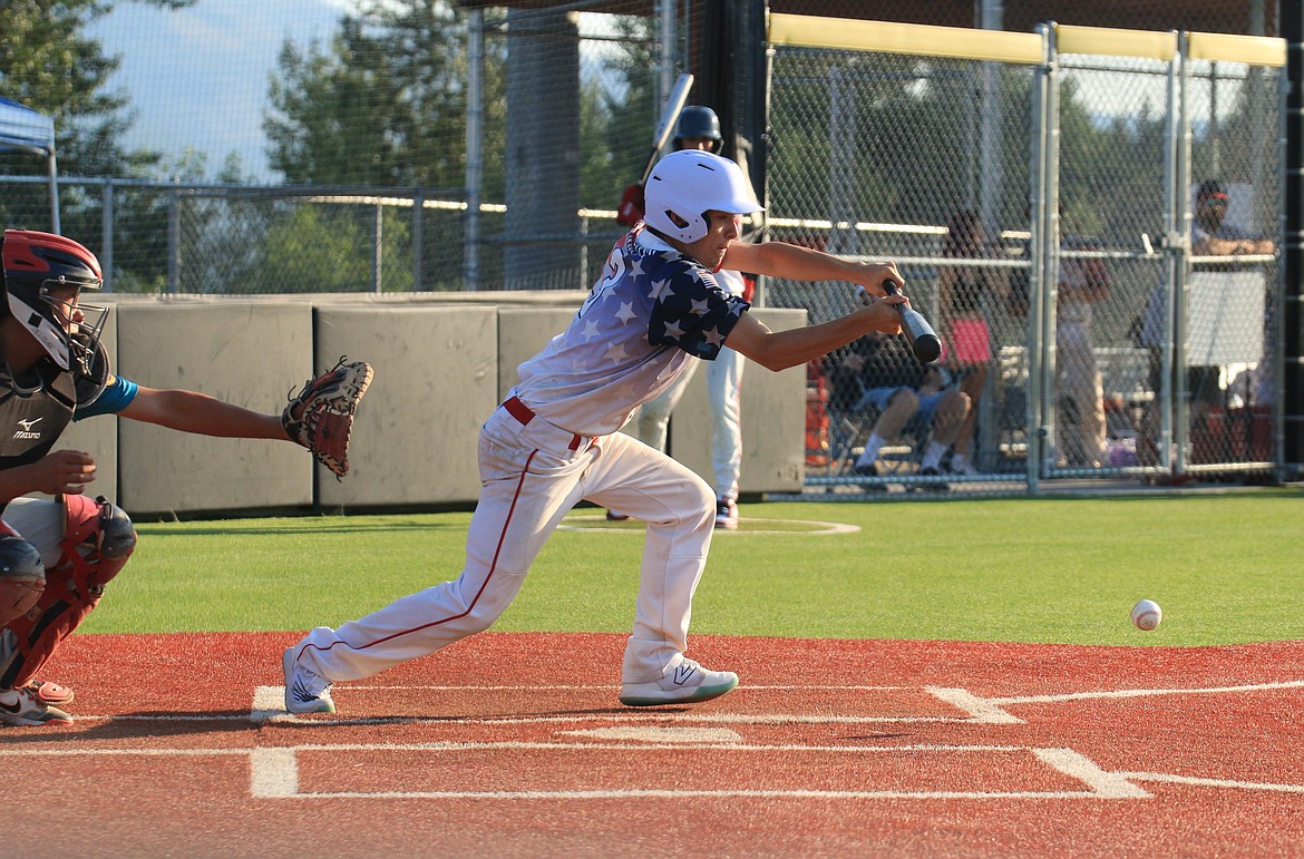 Cole Sanroman bunts down the first base line during the second game against Camas Prairie. Due to miscommunication by the Zephyrs, nobody was covering first base and Cole made it all the way to third and the Lakers scored two runs on the play.