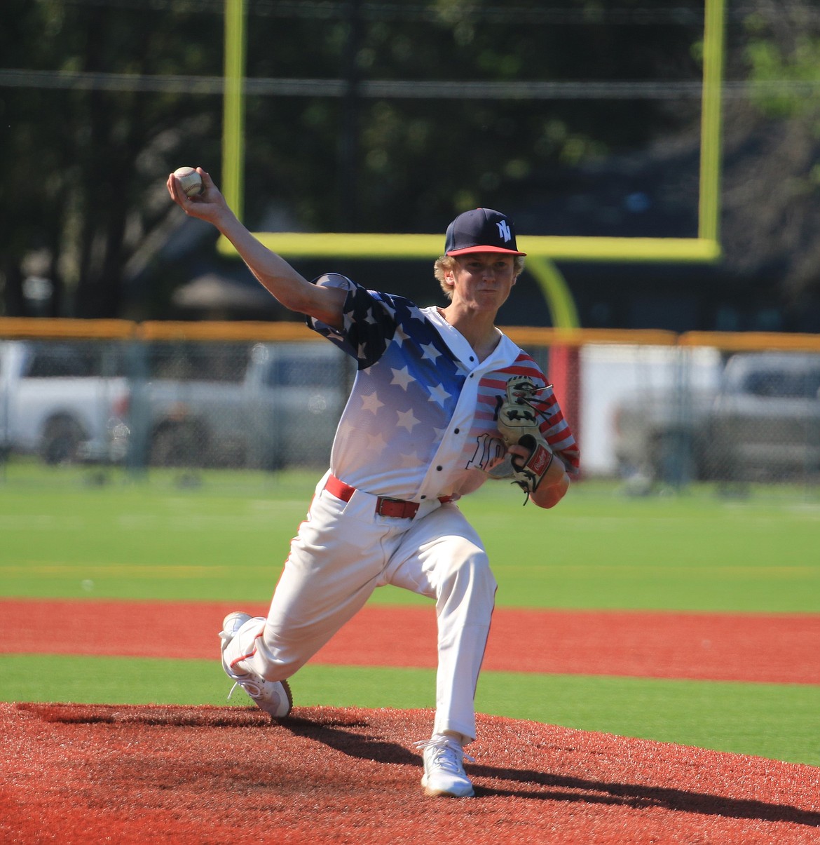 Coleman Inge, who picked up his first win of the summer season on Saturday, gets ready to release a pitch during the first game against Camas Prairie.