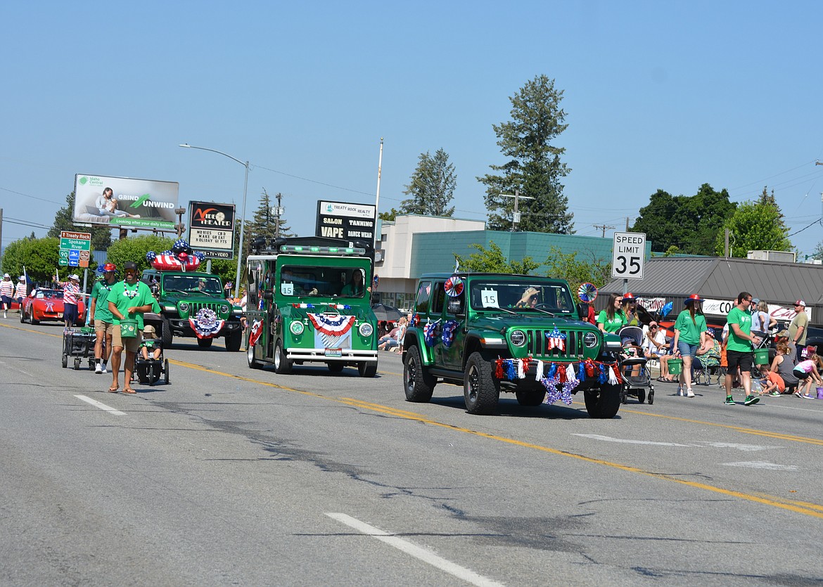 The song, Crazy Train is blasted as part of the Idaho Central Credit Union members in the Post Falls parade.