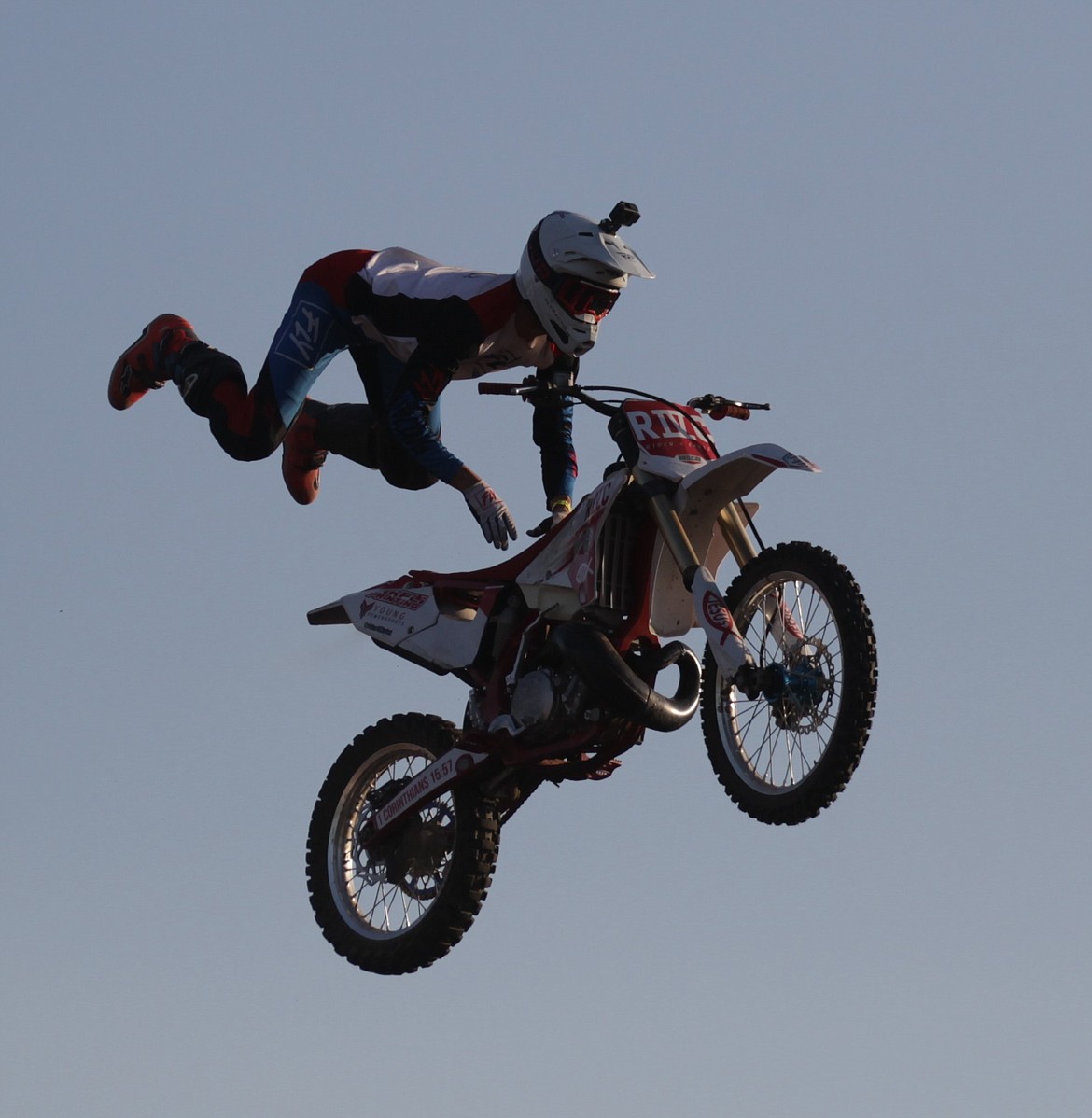 JASON ELLIOTT/Press
Justin Holman flies through the air after doing a front flip on his motorcycle during the opening ceremonies of Saturday's Arenacross event at the Kootenai County Fairgrounds.