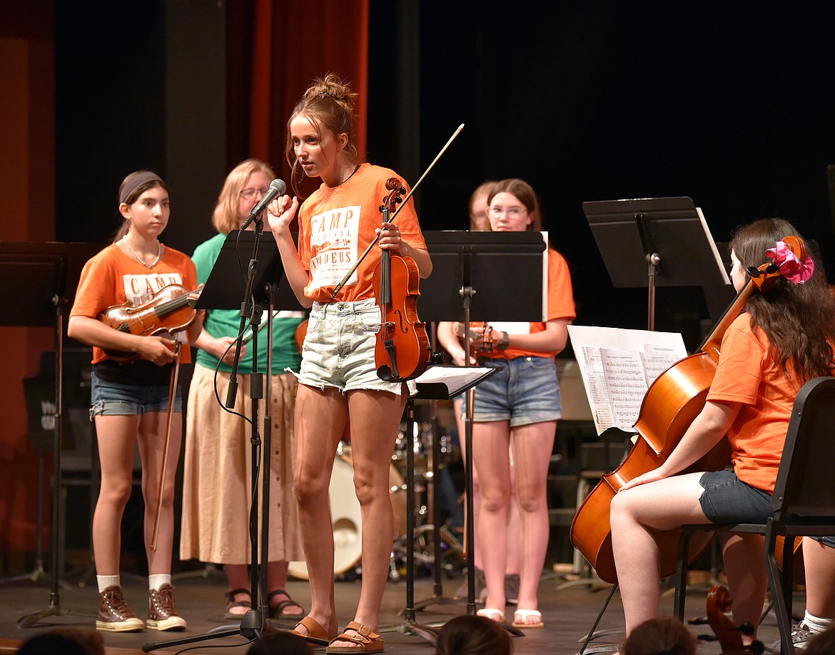 Cassidy Krack introduces ensemble at the Camp Festival Amadeus concert. (Julie Engler/Whitefish Pilot)