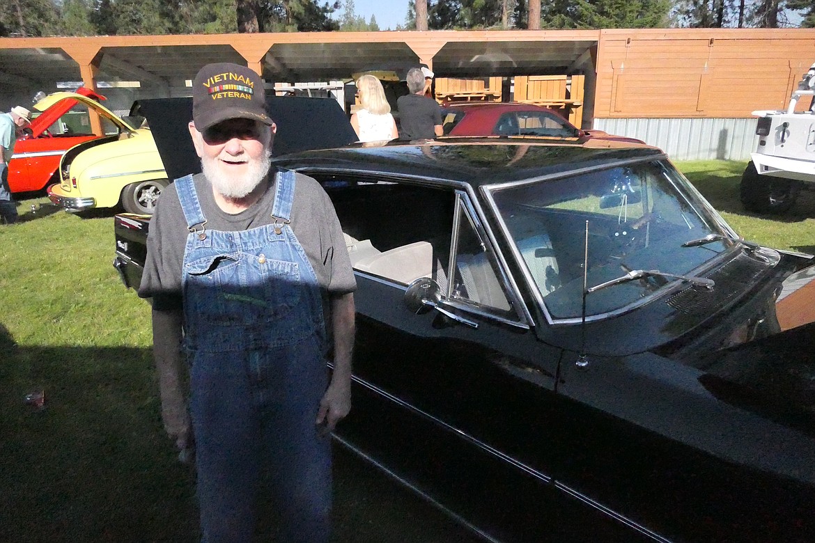 Trout Creek resident Vern Buchanan proudly displays his 1966 Chevy Nova at this year's annual Car Show at Trout Creek Park this past Saturday. (Chuck Bandel/VP-MI)