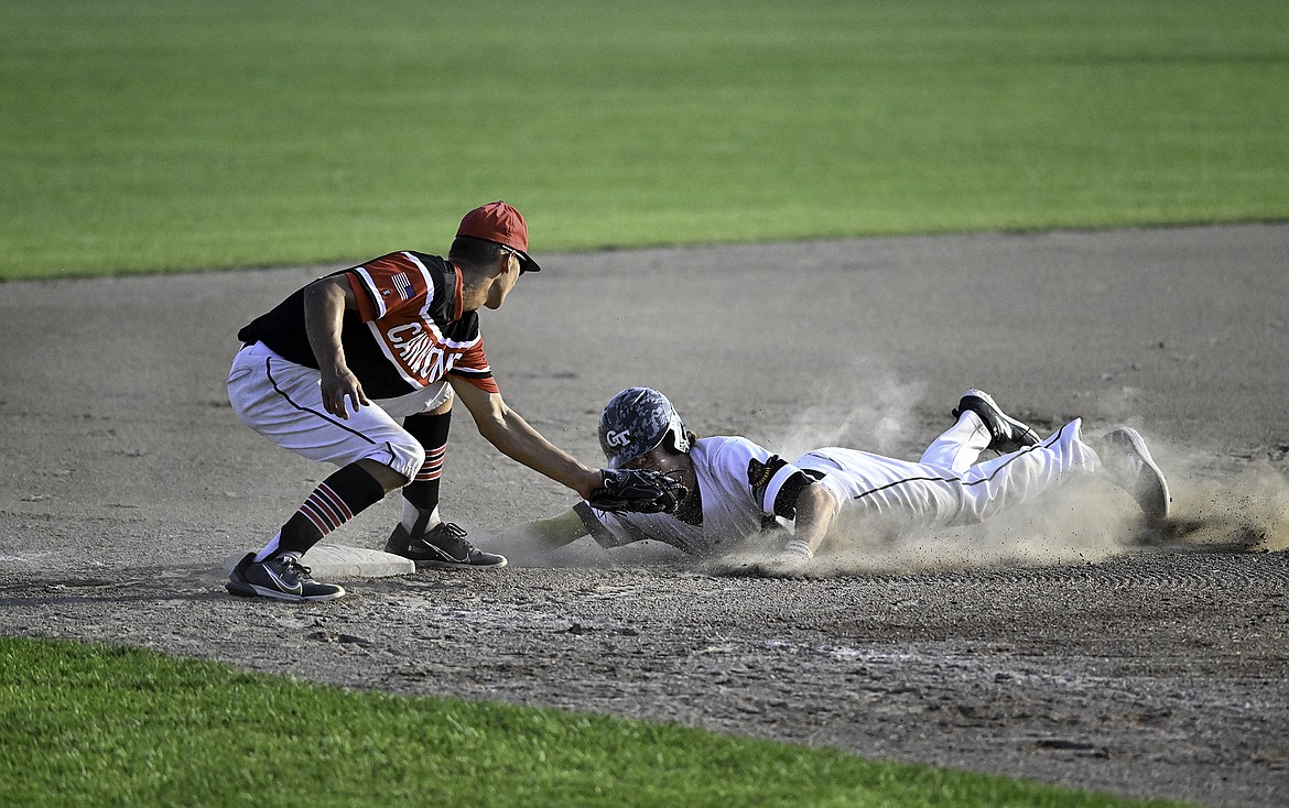 Nolan Amerman slides in safe to third base during the Glacier Twins 5-1 win over the West Plains Cannons. Seth Anderson Photo