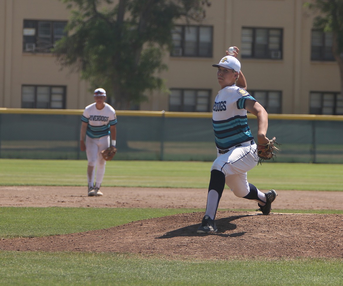 River Dog pitcher Kason Whitaker pitches against Pullman in the semifinals of the River Dog Memorial Tournament on Sunday in Moses Lake.