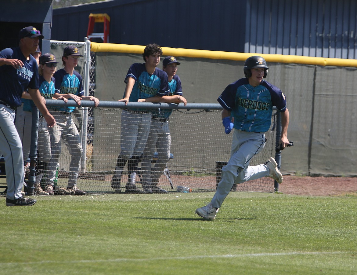 River Dog right fielder Adrian Martinez rounds third base during a pool play game against Penticton on Saturday.