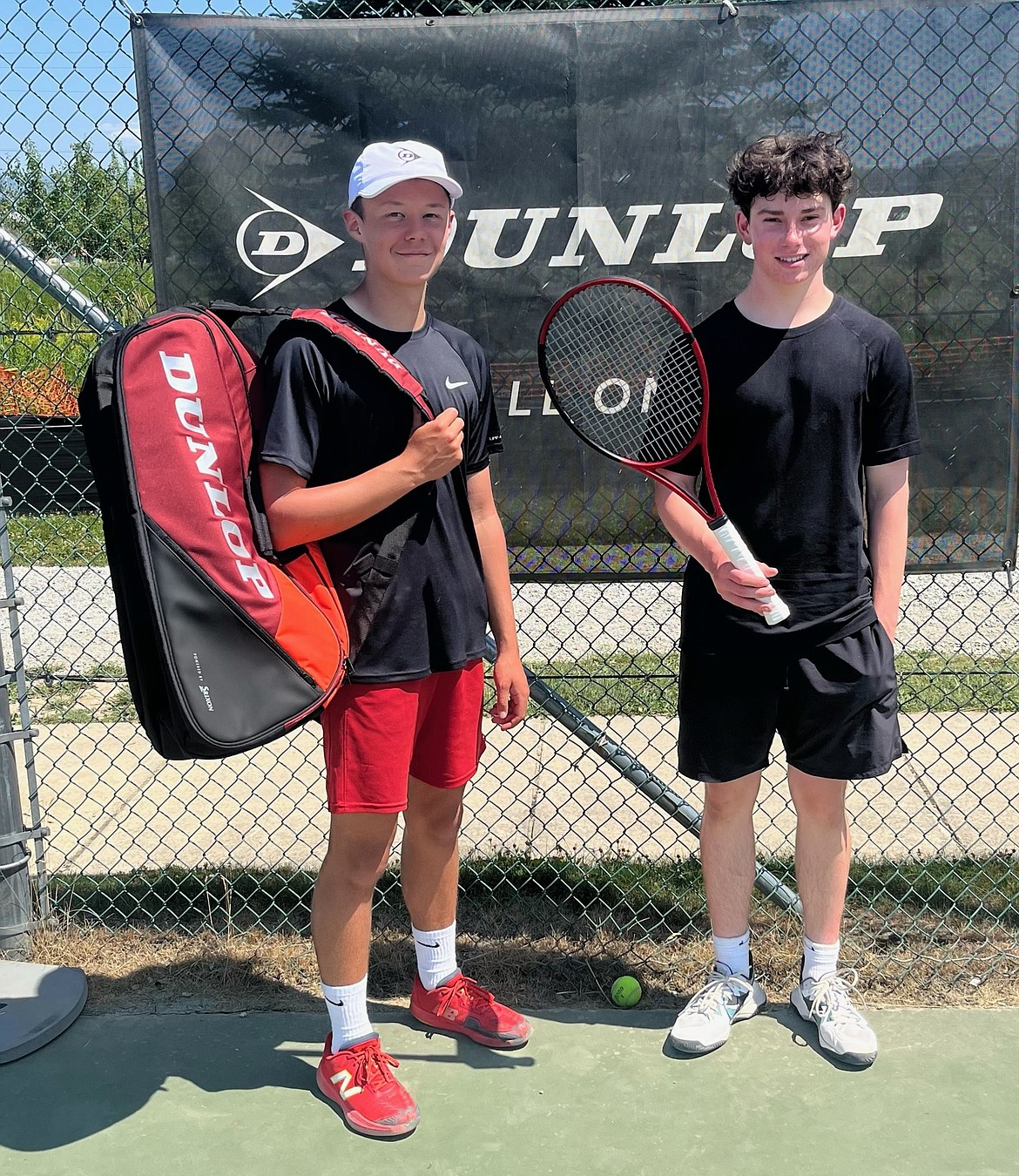 Sandpoint High varsity tennis players Fisher Dail, left, and Jacob Dawson were the top two players of the SHS tennis camp's individual tournament. Dawson won the tournament and received a Dunlop CX200 Tour racket for his efforts. Dail received an 8-racket Dunlop travel bag for finishing runner-up.