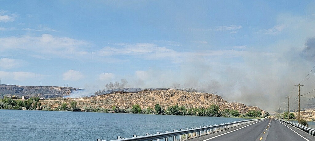 A wildfire near Sunbanks Resort in Electric City prompted evacuation noticed Tuesday afternoon.