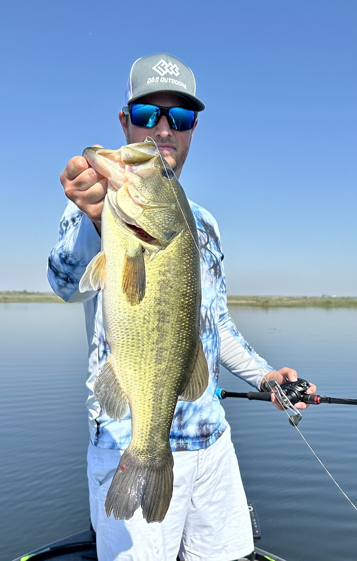 Wyatt Smith with Q&S Outdoors Guide Service is on a hot frog bite on the Potholes Reservoir.