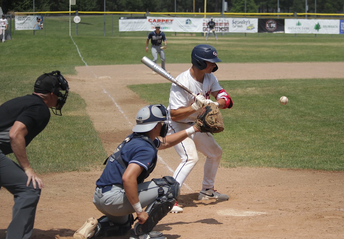 MARK NELKE/Press
Kolbe Coey of the Coeur d'Alene Lumbermen watches the 15th pitch of the at-bat sail just out of the strike zone for ball four in the fourth inning against the Missoula Mavericks on Tuesday at Thorco Field. Coey fouled off 10 pitches in the at-bat, including six in a row, before drawing a bases-loaded walk to put the Lums on the board.