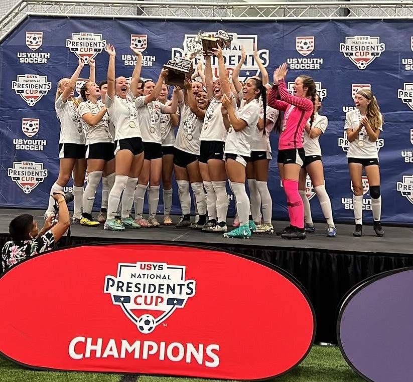 Photo by PAM GROTHE
The Thorns North FC 07 Girls Academy soccer team celebrates after receiving the trophy after winning the 17U girls division at the U.S. Youth Soccer National Presidents Cup in Wichita, Kan.