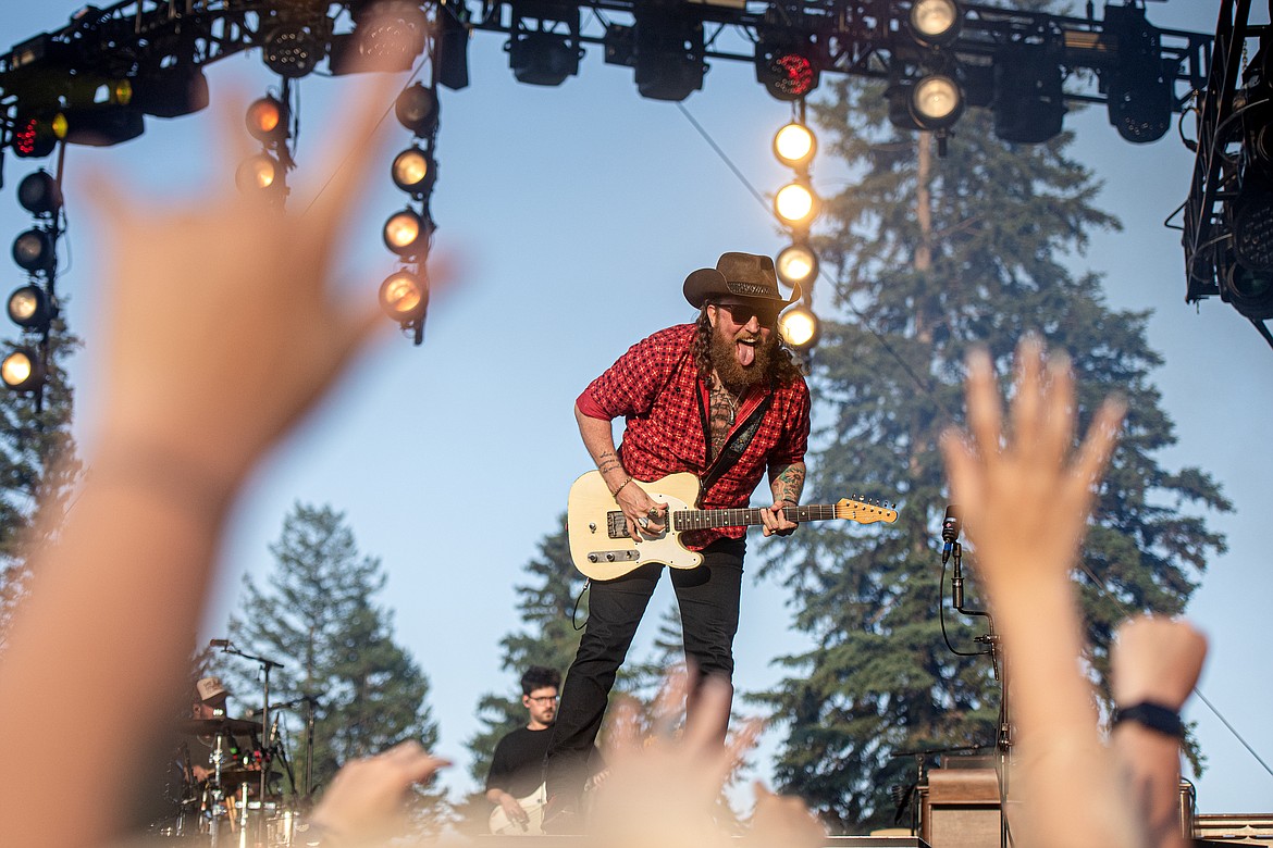 John Osborne of Brothers Osborne riles up the crowd at Under the Big Sky on Friday, July 12. (Avery Howe/Bigfork Eagle)