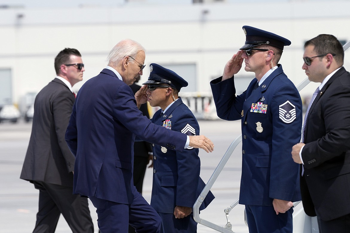 President Joe Biden walks up the steps of Air Force One at Harry Reid International Airport in Las Vegas, Wednesday, July 17, 2024. Biden has tested positive for the coronavirus, according to a speaker at the UnidosUS annual conference broadcast on the White House's YouTube channel. (AP Photo/Susan Walsh)