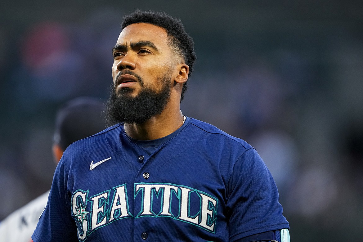 LINDSEY WASSON/Associated Press
Former Seattle Mariner Teoscar Hernandez walks back to the dugout after grounding out against the Minnesota Twins during a July 2023 game in Seattle.