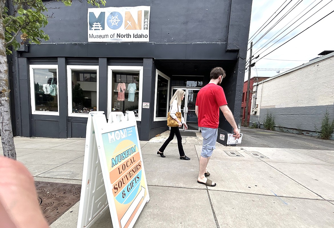 People walk past the Museum of North Idaho, 115 S., Fourth St., in Coeur d'Alene.