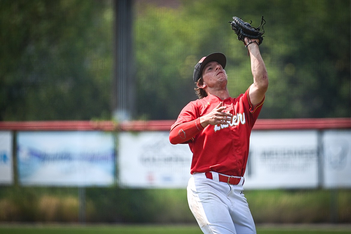 Lakers AA first baseman MIchael Owens (8) squeezes a pop fly against the Billings Scarlets at Griffin Field on Thursday, July 18. (Casey Kreider/Daily Inter Lake)