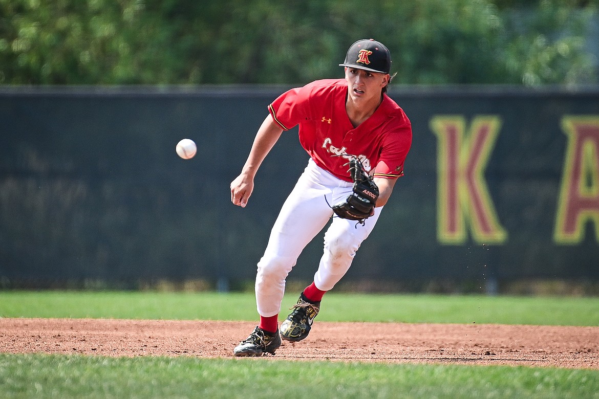 Lakers AA second baseman Ostyn Brennan (10) charges a grounder against the Billings Scarlets at Griffin Field on Thursday, July 18. (Casey Kreider/Daily Inter Lake)