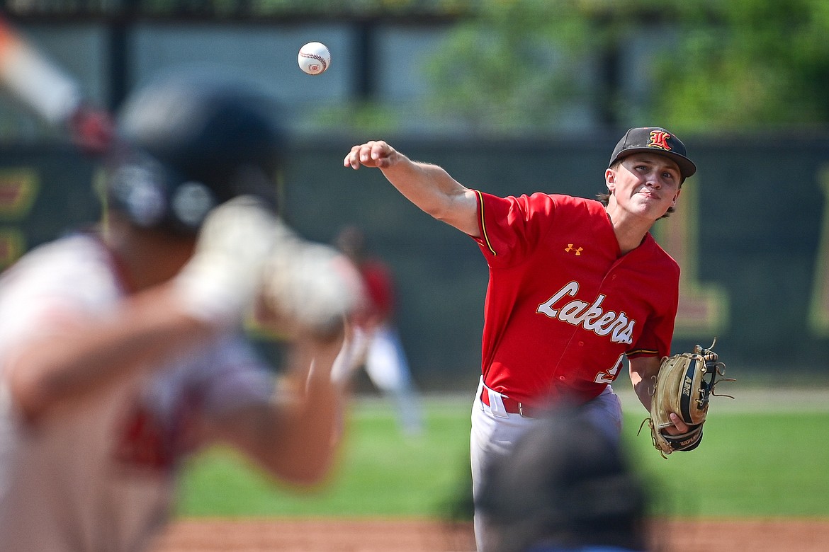 Lakers AA starting pitcher Carter Schlegel (5) delivers against the Billings Scarlets at Griffin Field on Thursday, July 18. (Casey Kreider/Daily Inter Lake)