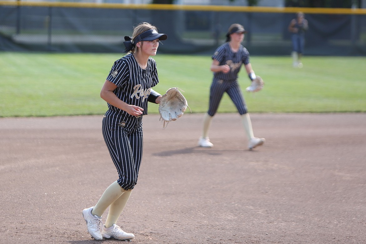 Royal’s Jill Allred, left, lines up at third base ahead of a pitch during the 2023 state championship game against Montesano. Allred split time at pitcher that year with 2023 graduate Madison Ortega-Sanchez, but moved into the team’s full-time pitcher this season.