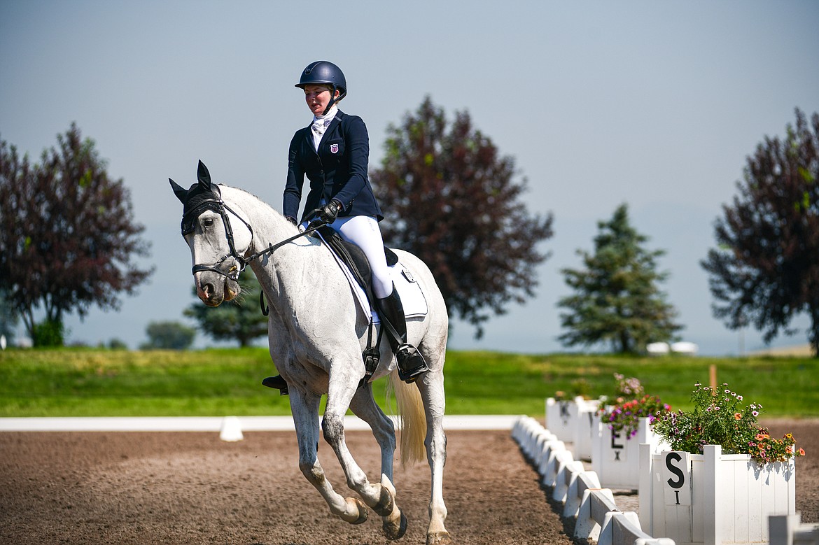 Greylin Booth rides Modesto RE around the arena during Open Preliminary B dressage at The Event at Rebecca Farm on Friday, July 19. (Casey Kreider/Daily Inter Lake)