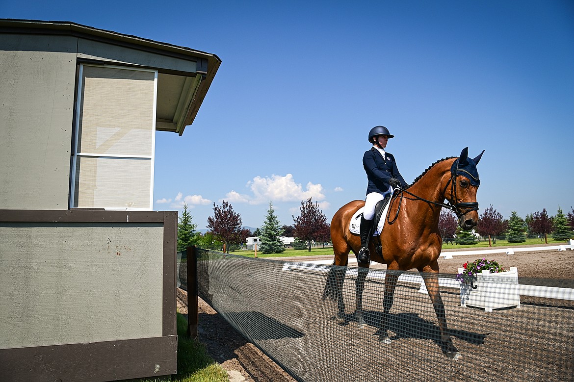 Brooke Corsaut enters the arena on Juste Capitaine during Open Preliminary A dressage at The Event at Rebecca Farm on Friday, July 19. (Casey Kreider/Daily Inter Lake)