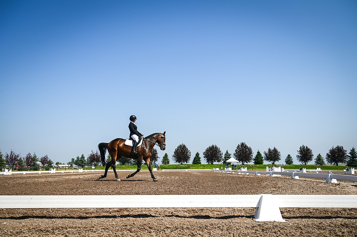 McLaine Mangum rides Grantstown Mr. Big around the arena during Open Preliminary A dressage at The Event at Rebecca Farm on Friday, July 19. (Casey Kreider/Daily Inter Lake)