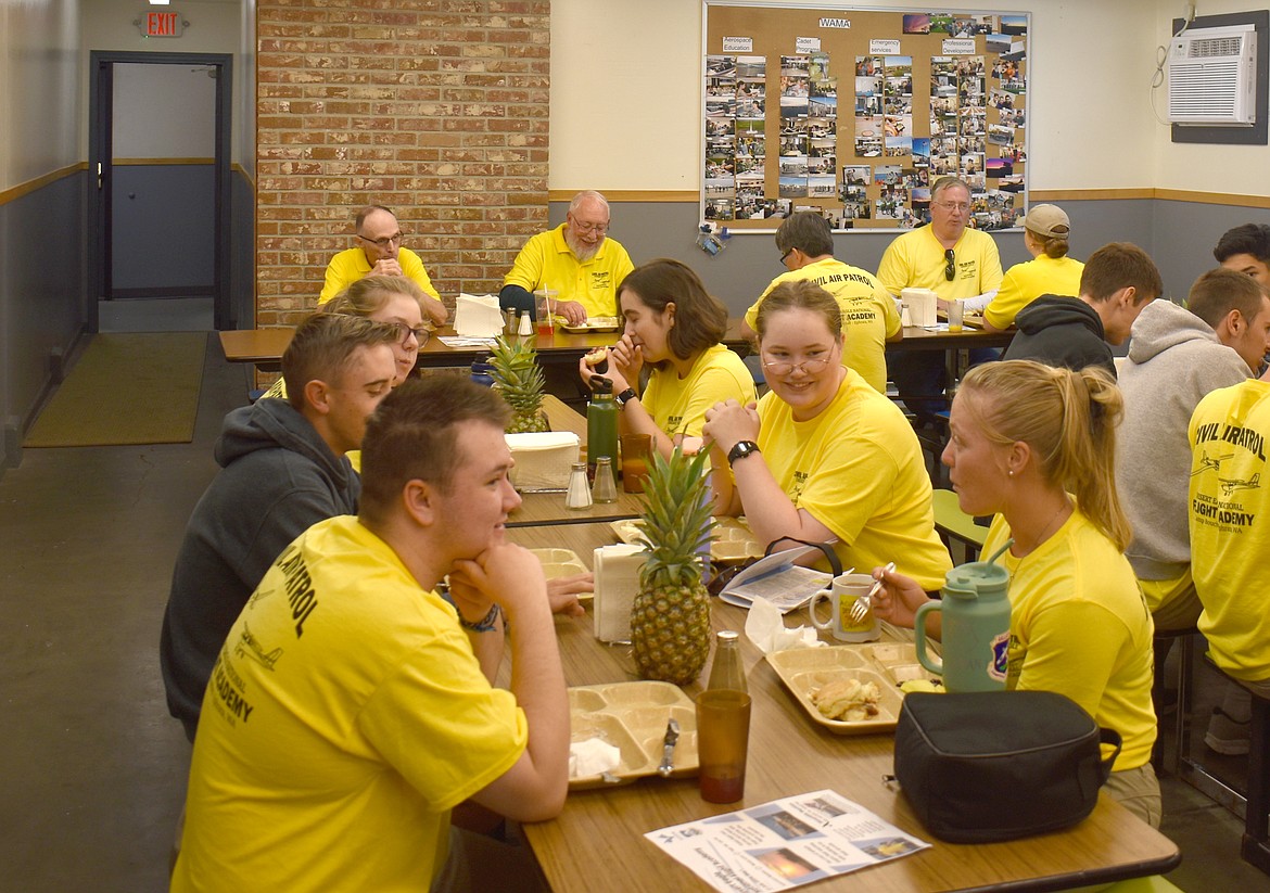 Cadets have breakfast at the National Flight Academy Thursday at the Ephrata Airport. Ephrata has hosted the academy for 20 years largely because it has sleeping and dining facilities for the cadets onsite.