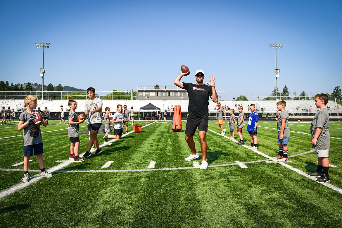 Former NFL and Flathead Braves quarterback Brock Osweiler runs a drill with campers at the Flathead Braves Football Camp at Legends Stadium on Saturday, July 20. (Casey Kreider/Daily Inter Lake)