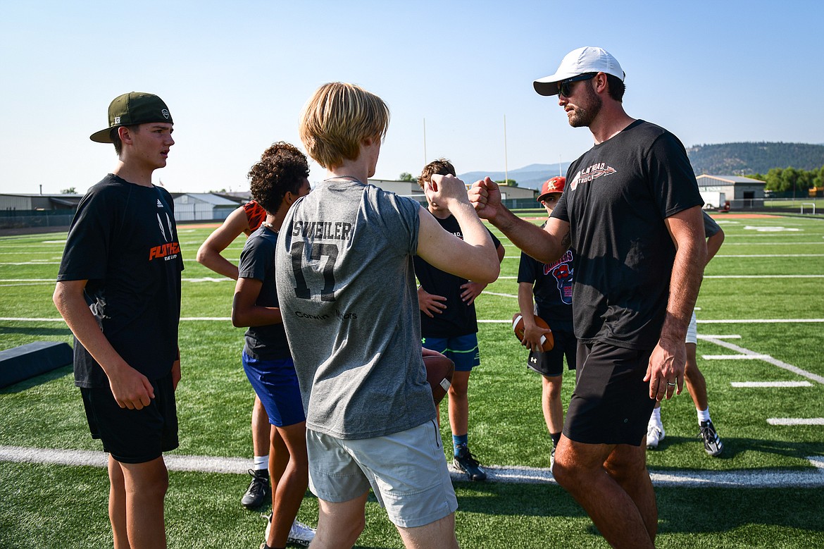 Former NFL and Flathead Braves quarterback Brock Osweiler speaks to campers during the Flathead Braves Football Camp at Legends Stadium on Saturday, July 20. (Casey Kreider/Daily Inter Lake)