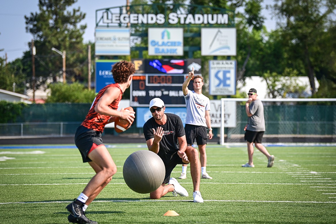 Former NFL and Flathead Braves quarterback Brock Osweiler runs a drill with campers at the Flathead Braves Football Camp at Legends Stadium on Saturday, July 20. (Casey Kreider/Daily Inter Lake)