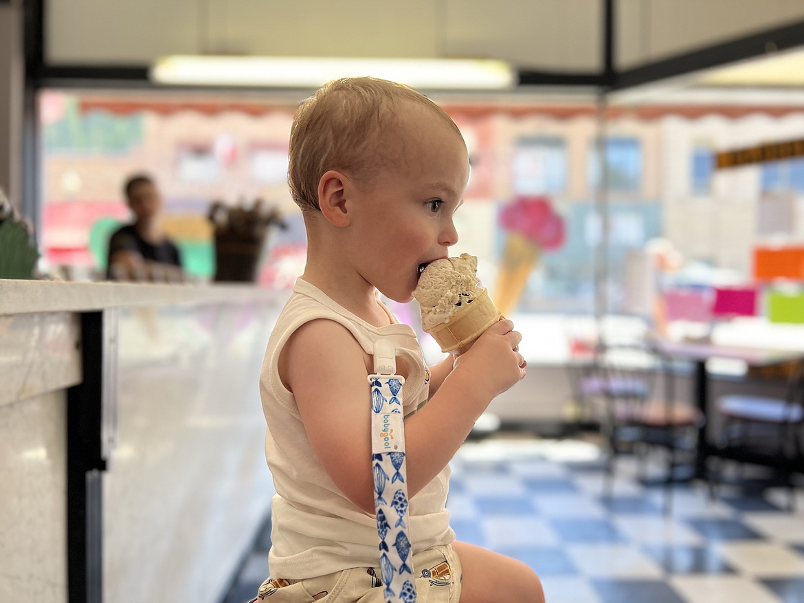 Twenty-two-month-old Bradley Wyatt prefers to enjoy his cookie dough ice cream on a cone at the Sierra Silver Mine Tour Gift Shop's ice cream bar.