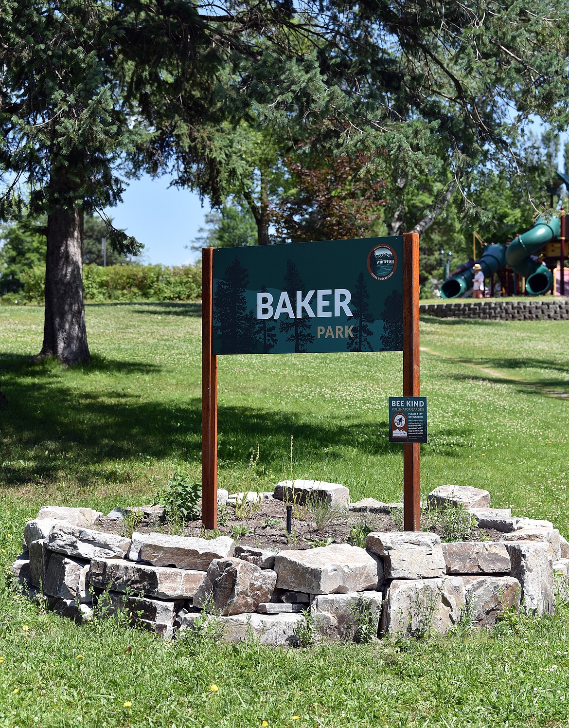 The new pollinator garden and park sign in Baker Park. (Julie Engler/Whitefish Pilot)