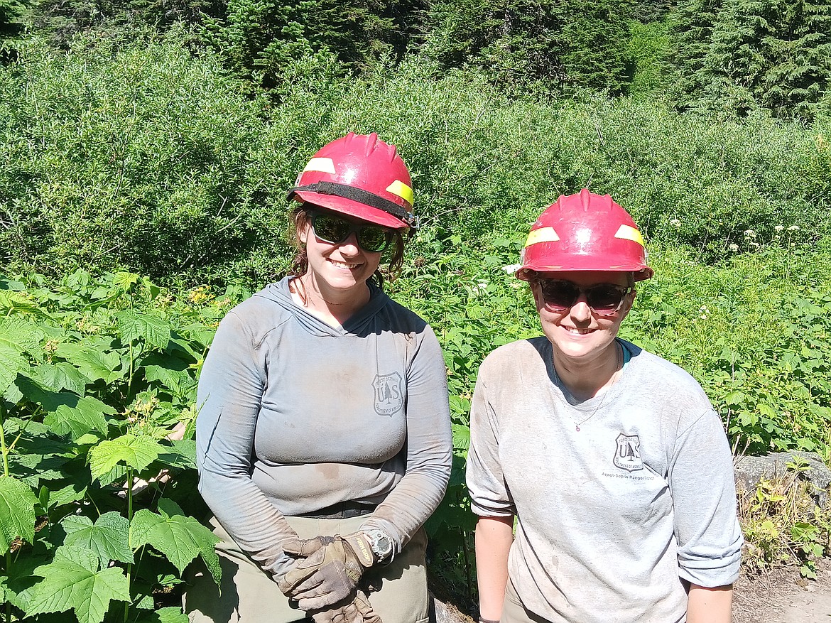 Lindsay Civn, left, and Susannah Carter with the USFS were doing trail maintenance on the Heart Lake trail Fridy. This was a 6-day hitch keeping them in the field 24/7. (Monte Turner/Mineral Independent)