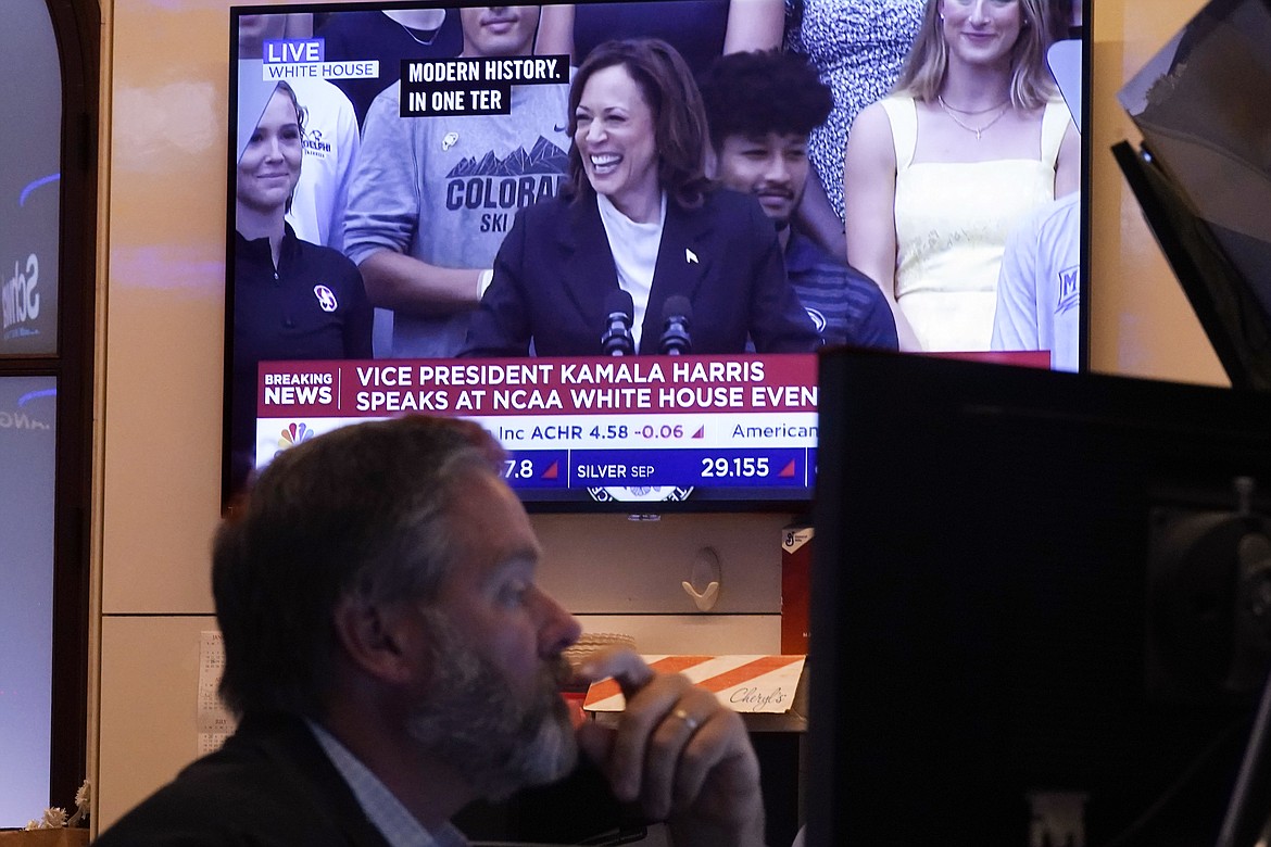 A television on the floor of the New York Stock Exchange shows U.S. Vice President Kamala Harris speaking at the White House, Monday, July 22, 2024. (AP Photo/Richard Drew)