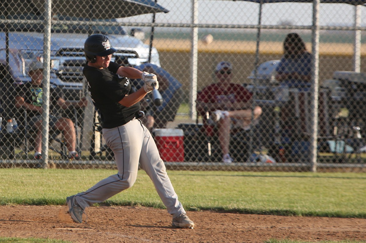 ACH shortstop Caden Correia records a hit during a July 12 game against Gonzaga Prep in Hartline. Correia had three hits in Sunday’s game against Northwest Christian.