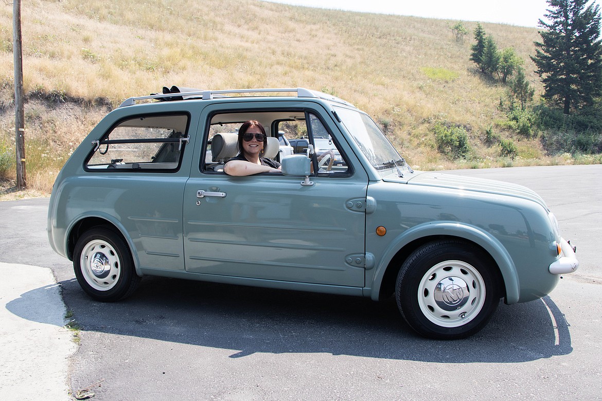 Heidi Fletcher won the People's Choice award for her 1990 Nissan Pao at the 2023 Show N Shine car show in Evergreen. (Kate Heston/Daily Inter Lake)