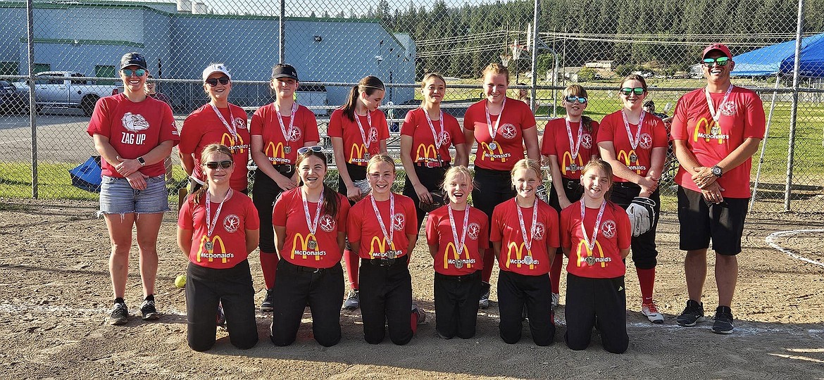 Courtesy photo
The Spokane Valley U12-U14 McDonald's fastpitch softball team, which includes two players from Post Falls, finished in second place last week at the Spokane Valley Girls Softball Association Tournament. In the front row from left are Claire Osborn, Pilar Wirth, Nora Schock (Post Falls), Bailey Nilson, Macie Christensen and Francesca Wirth; and back row from left, coach Alita Nilson, coach Shantel Almeida, Malia Almeida, Kynley Searcey, Zoe Nix, Izzy Bohr, Diana Wiltse (Post Falls), Sydney Knezvich and coach Geoff Christensen. Not pictured is Adilyn Worley.