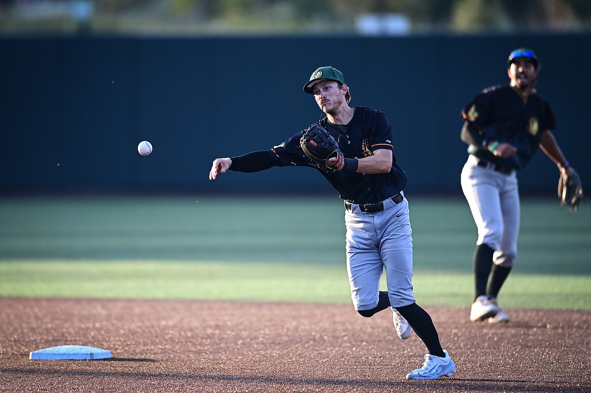 Boise shortstop Tyler Jorgenson (24) turns a double play in the fourth inning against Glacier at Glacier Bank Park on Tuesday, July 23. (Casey Kreider/Daily Inter Lake)