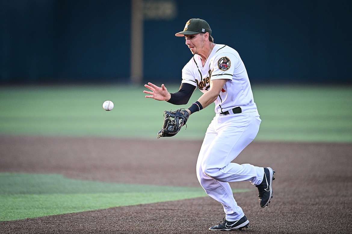 Glacier second baseman Christian Kirtley (1) charges a ground ball in the sixth inning against Boise at Glacier Bank Park on Tuesday, July 23. (Casey Kreider/Daily Inter Lake)