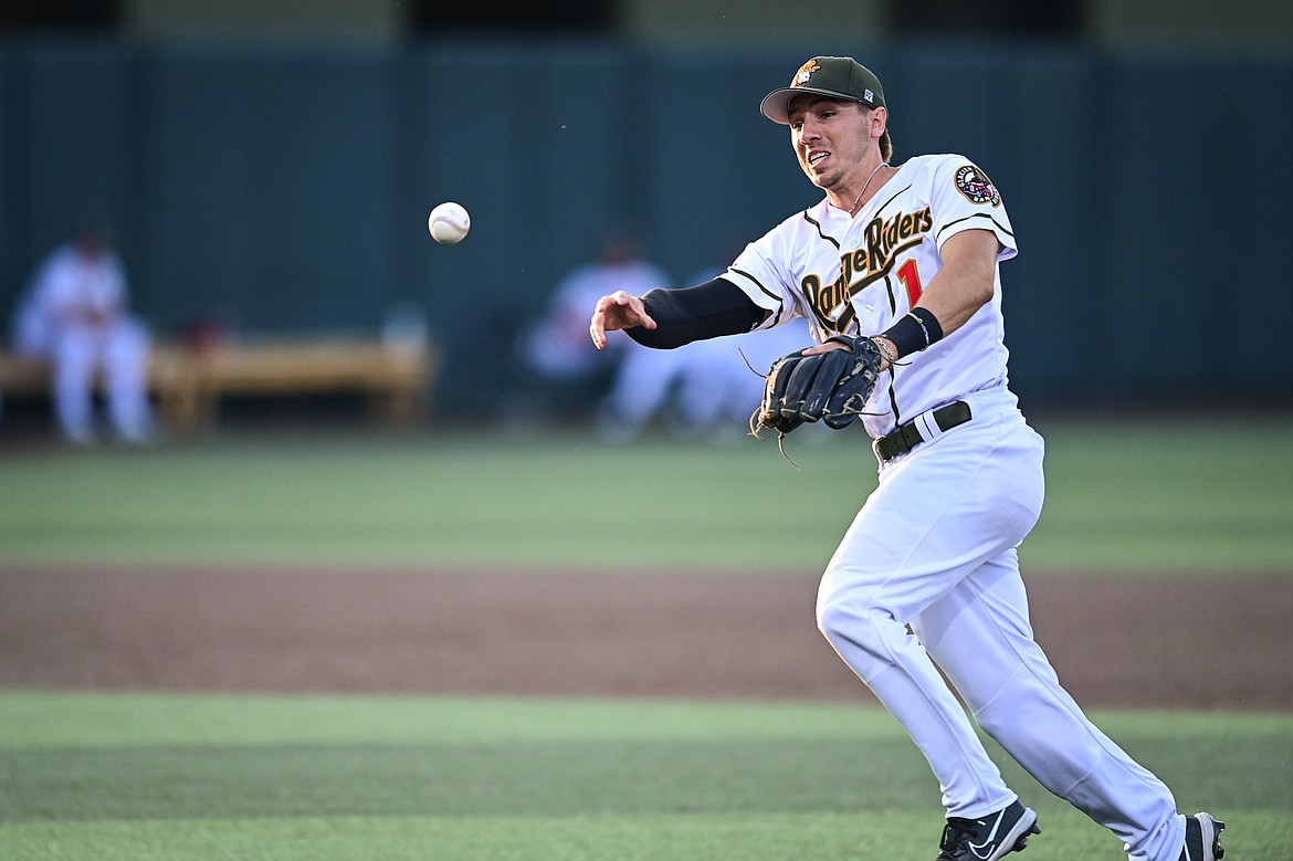 Glacier second baseman Christian Kirtley (1) charges a ground ball and throws to first base in the sixth inning against Boise at Glacier Bank Park on Tuesday, July 23. (Casey Kreider/Daily Inter Lake)