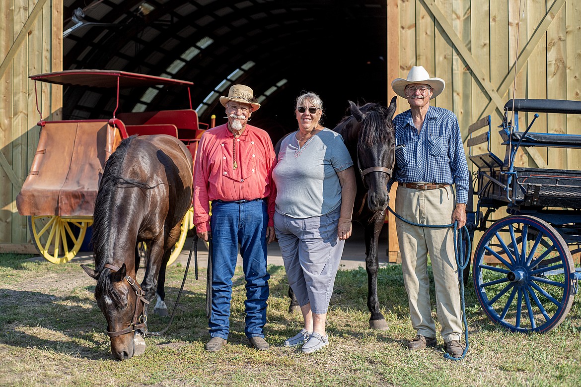 Dale and Pat Mee and Doug Howser of Bigfork Stagecoach Rides and Rentals at Wrangler Springs Friday, July 19. (Avery Howe/Bigfork Eagle)